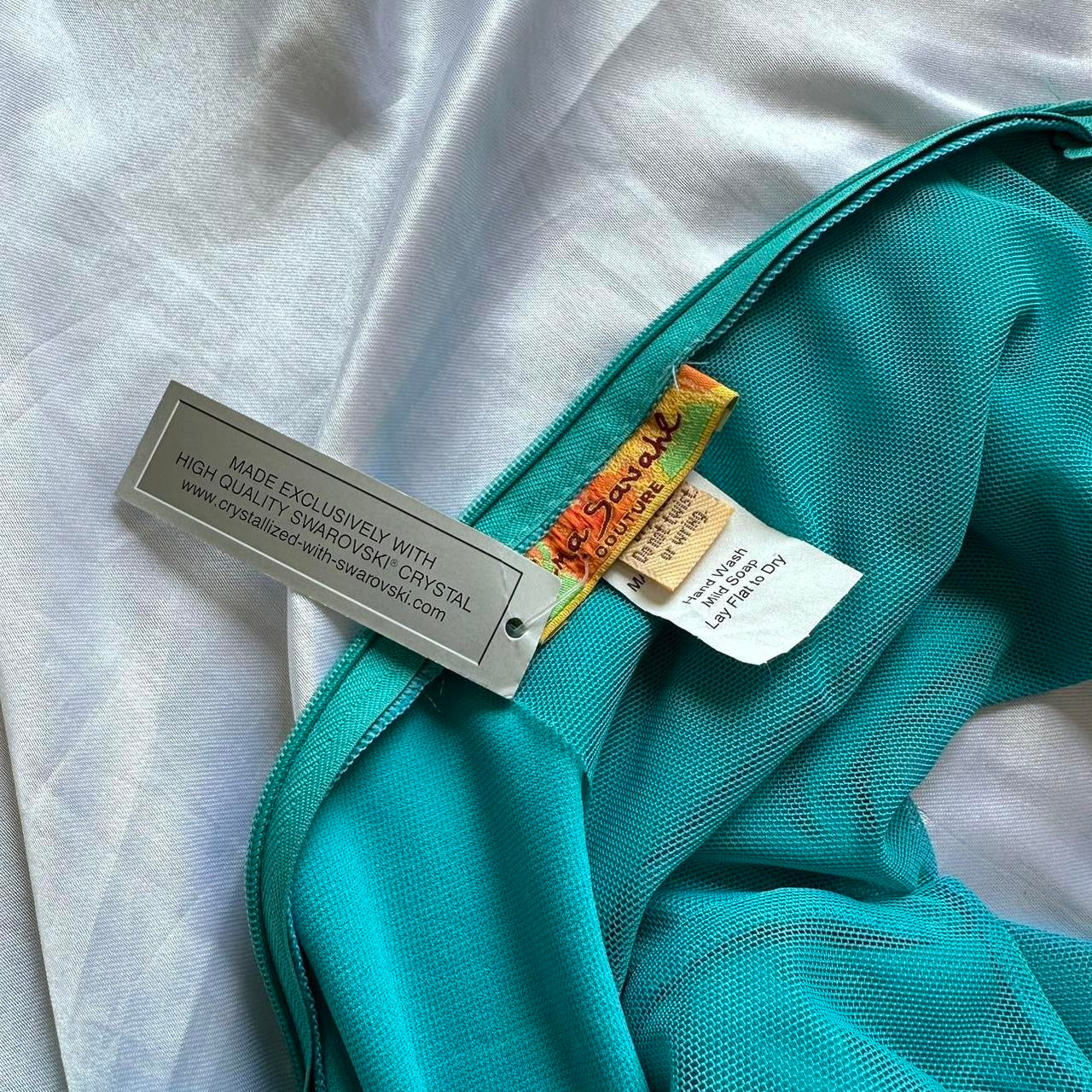 TURQUOISE GLAMOUR FISHTAIL GOWN BY EMA SAVAHL COUTURE