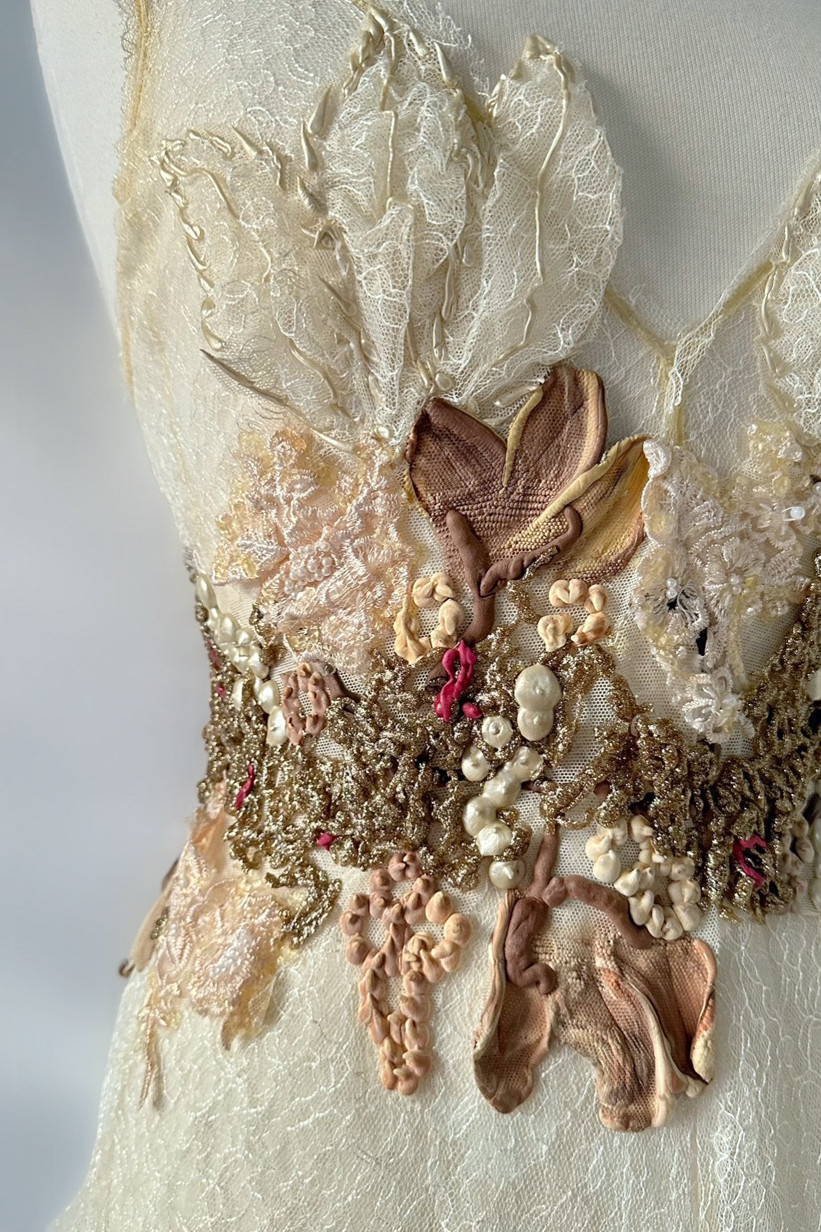 IVORY DRAPED LACE BUBBLE HEM GOWN BY EMA SAVAHL COUTURE
