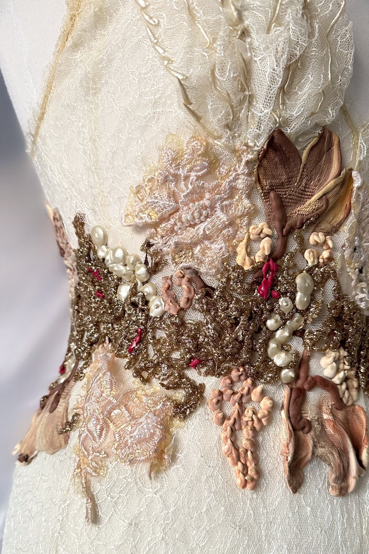 IVORY DRAPED LACE BUBBLE HEM GOWN BY EMA SAVAHL COUTURE