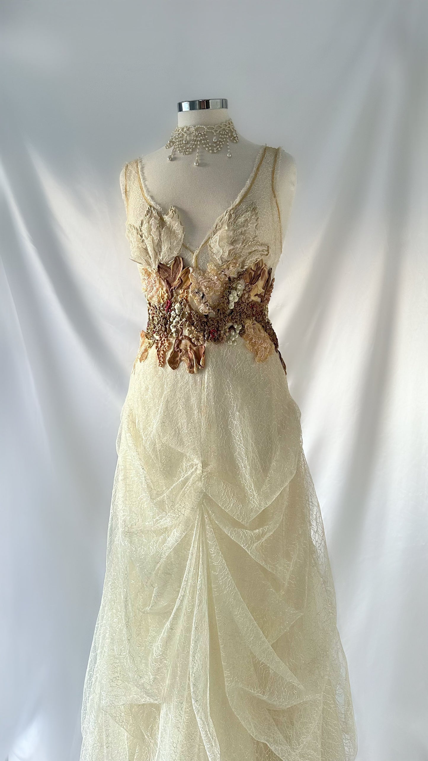 IVORY DRAPED LACE BUBBLE HEM GOWN BY EMA SAVAHL COUTURE