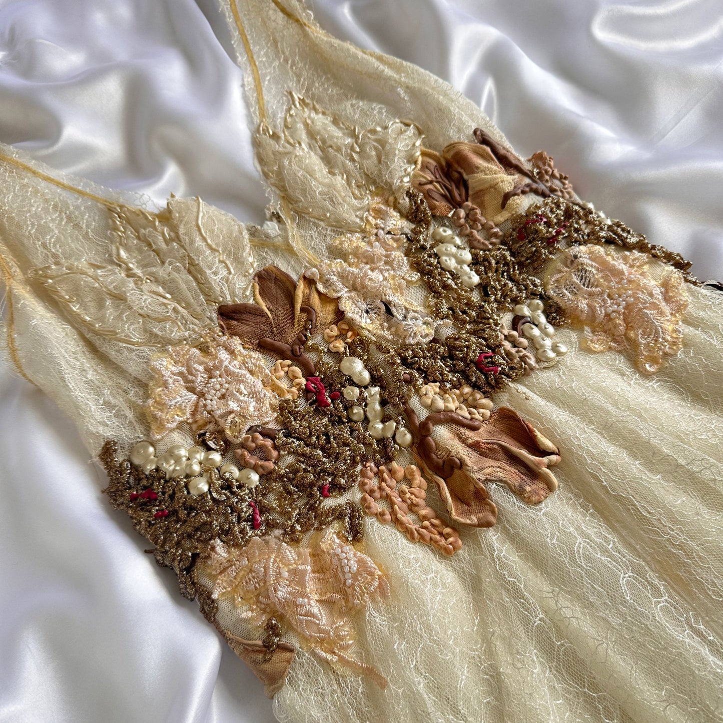 IVORY DRAPED LACE BUBBLE HEM GOWN BY EMA SAVAHL COUTURE