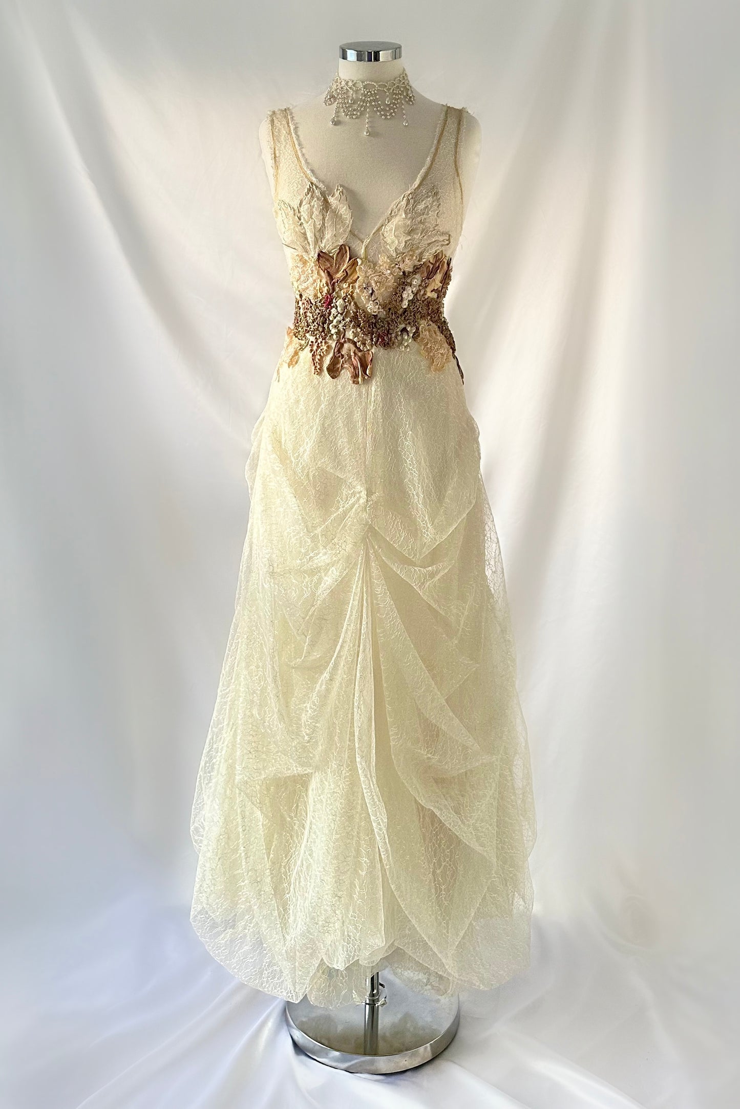 IVORY DRAPED LACE BUBBLE HEM GOWN BY EMA SAVAHL COUTURE