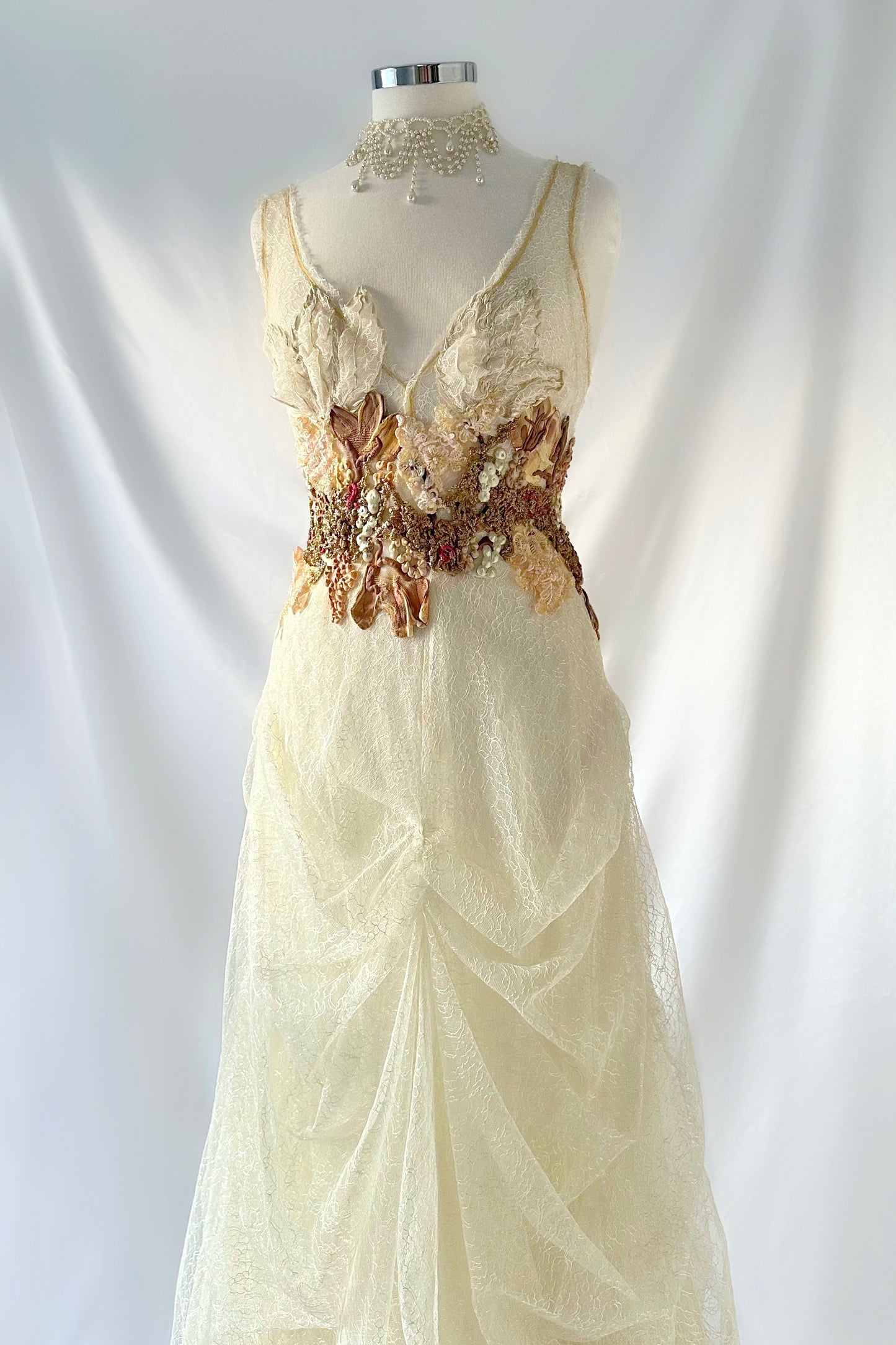IVORY DRAPED LACE BUBBLE HEM GOWN BY EMA SAVAHL COUTURE